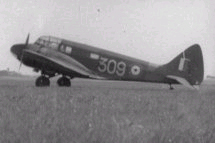 Airspeed Oxford No 309.Its hard to see the entrance door that we used to hop thru to get on board.It's roughly where the insignia is.Not very big,and we had to be quick.Wouldn't-want to be half in when they started their take off roll!!!