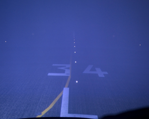 Pilot's view of Sydney Runway 34 with simulated 125 metre (minimum takeoff) visibility. A380 operators permit landings with just 75 metres visibility. (Photo Richard de Crespigny)