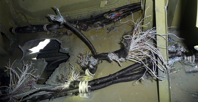 Cut wires in leading edge - left wing