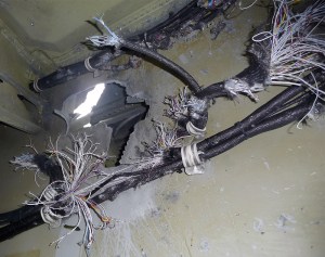 Electrical and forward wing spar damage to the left wing